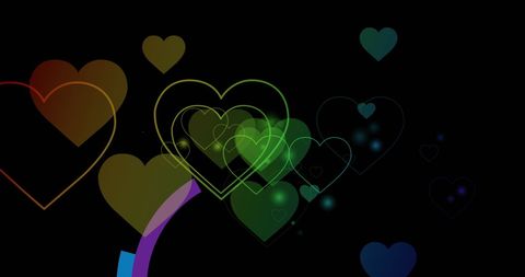 Colorful rainbow hearts on black background celebrating diversity