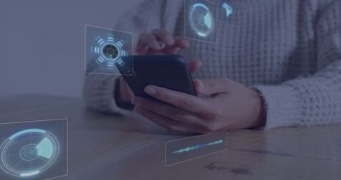 Woman interacting with futuristic holographic smartphone interface