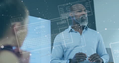 Diverse Team Engaged in Digital Business Strategy Meeting