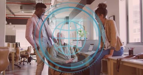 Creative team laughing and collaborating in modern open office with futuristic HUD overlay