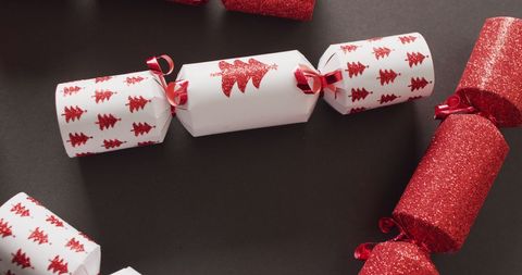 Festive Christmas Crackers with Red and White Designs