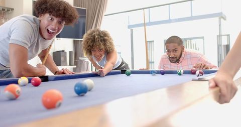 Diverse Friends Playing Pool, Enjoying Leisure and Fun Interaction - Download Free Stock Images Pikwizard.com