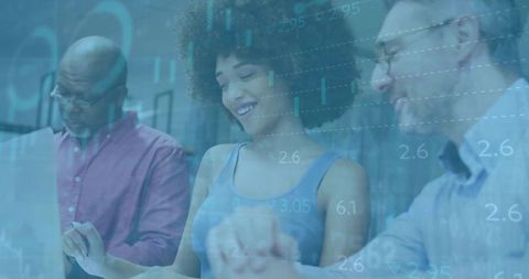 Diverse team collaborating on fintech analytics and metrics with laptop and data overlay