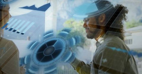 Businessman interacting with holographic technology in modern office