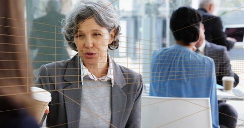 mature professional woman engaging in business conversation - Download Free Stock Images Pikwizard.com