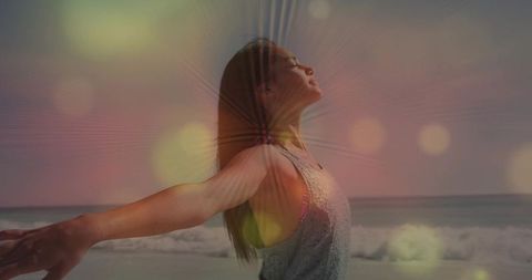 Serene Woman Embracing Sunrise on Sandy Beach for Tranquility