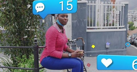 Woman Engaged in Social Media Outdoors in Urban Area