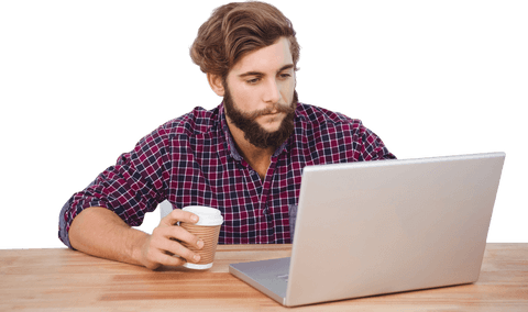 Focused Bearded Man with Coffee at Laptop on Wood Desk - Download Free Stock Videos Pikwizard.com