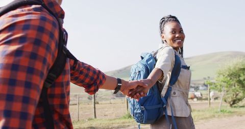 Couple Hiking Together Holding Hands