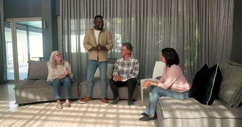 Senior Woman Engaging in Group Therapy Session