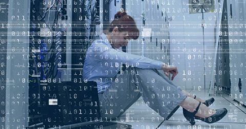 Overwhelmed IT Professional in Server Room with Digital Interference