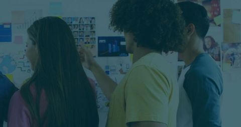 Innovative Team Collaborating with Sticky Notes and Charts