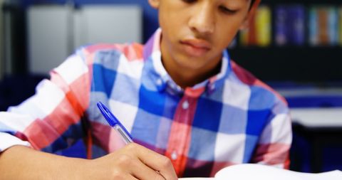 Focused Student Engaging in Classroom Learning Activities