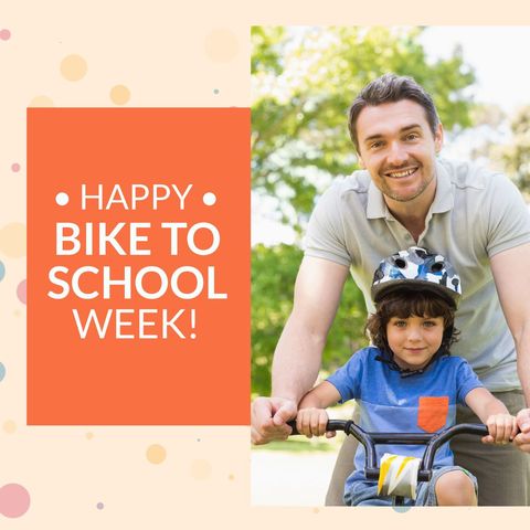 Father and Son Celebrating Bike to School Week Outdoors