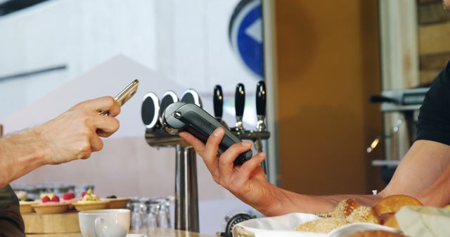 Men Discussing Electronic Device Over Breakfast at Home - Download Free Stock Images Pikwizard.com