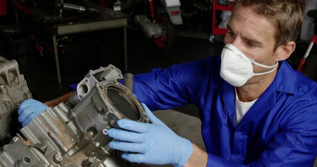 Auto Mechanic Diagnosing Engine Problem with Protective Gear - Download Free Stock Images Pikwizard.com