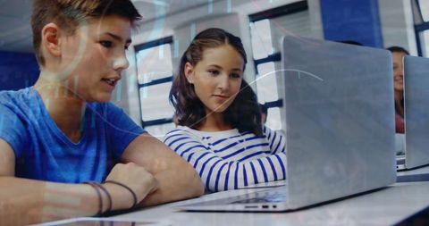 Students Engaged in Digital Learning with Graph Overlay - Download Free Stock Images Pikwizard.com
