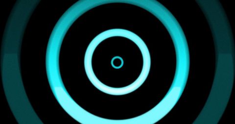 Neon Spinning Circles with Dynamic Color on Black Background