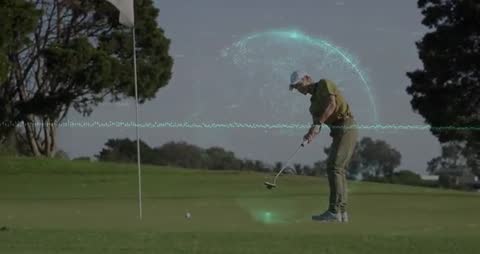 Golfer Using Technology for Precision Putting on a Sunny Day