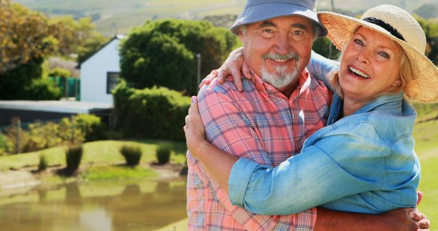 Happy Senior Couple Hugging Outdoors in Rural Setting - Download Free Stock Images Pikwizard.com