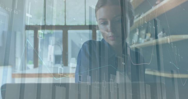 Businesswoman Analyzing Stock Market Charts on Laptop in Office - Download Free Stock Images Pikwizard.com