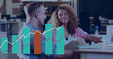 Coworkers discussing data visualization with charts overlay in modern collaborative office