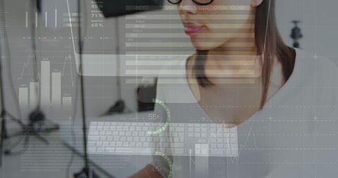 Woman Analyzing Data with Futuristic Interface Visual Display