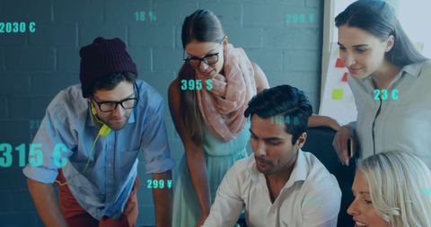 Diverse business team collaborating on financial data analytics