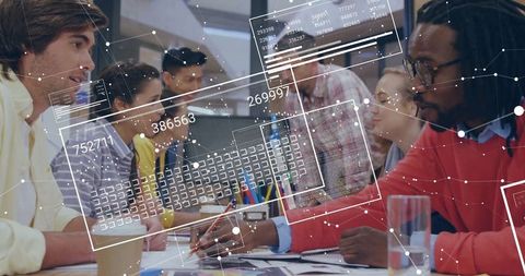 Diverse Team Collaborating on Analytics Projects in Modern Office