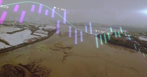 Aerial View of Wintry Farmland with Financial Data Overlay
