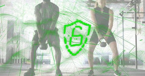 Dual athletes swinging kettlebells in industrial gym with green shield S digital overlay
