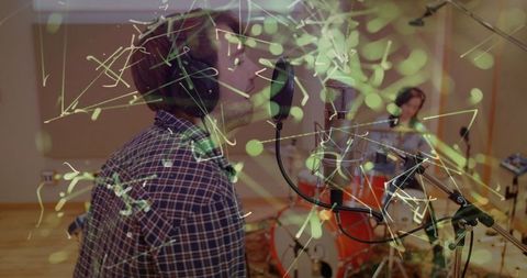 Musician and drummer recording studio collaboration