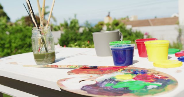 Outdoor Painting Supplies with Colorful Paints and Brushes - Download Free Stock Images Pikwizard.com