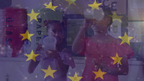 Two Girls Exploring with Science Projector and Stars Overlay