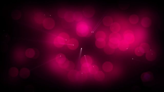 This abstract image features a dynamic display of red laser lights blurred against a dark background, creating a bokeh effect. It is ideal for use in futuristic themes, tech-related designs, or modern artwork projects. The vibrant red tone and dramatic lighting make it suitable for backgrounds in digital marketing, presentations, or events. Its abstract quality allows for versatile application in creative environments.