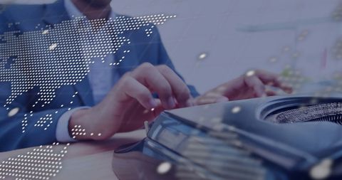 Businessman Analyzing Global Data with Laptop in Office