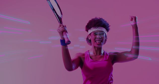 Joyful Female Tennis Player Celebrating Victory on Pink Background - Download Free Stock Images Pikwizard.com