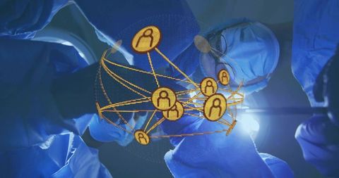 Surgical Team Performing Operation with Holographic Network Overlay for Connected Healthcare