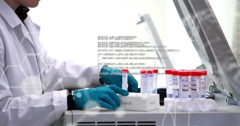 Scientist handling lab samples with data overlay