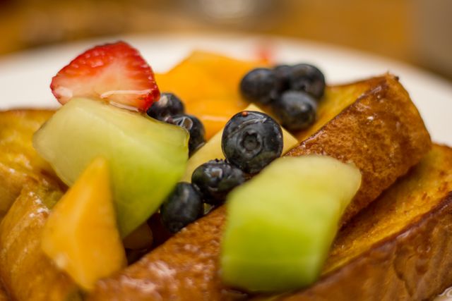 Closeup of Fresh Fruit on French Toast - Download Free Stock Photos Pikwizard.com