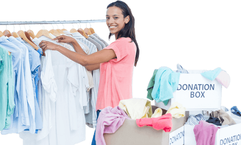 Smiling woman packing clothes into donation boxes on transparent background