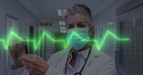 Doctor Wearing Mask Analyzing Medical Data with Heart Rate Overlay - Download Free Stock Images Pikwizard.com