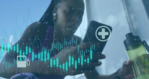 African American Female Athlete Using Smartphone with Fitness Apps