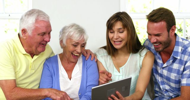 Happy Family with Tablet, Multi-Generational Enjoying Technology Together - Download Free Stock Images Pikwizard.com