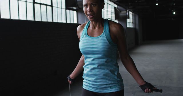 Athletic Woman Jumping Rope in Urban Gym - Download Free Stock Images Pikwizard.com