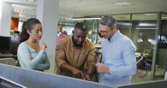 Diverse Business Team Collaborating with Tablets in Modern Office - Download Free Stock Images Pikwizard.com