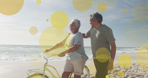 Senior Couple Enjoying Day at Beach with Bicycle