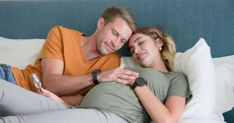 Expectant couple cherishing moments awaiting baby's arrival