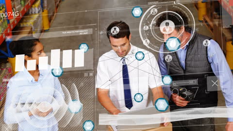 Team Analyzing Digital Data in Modern Warehouse