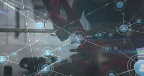 Boxer wrapping hands with digital network connection overlay